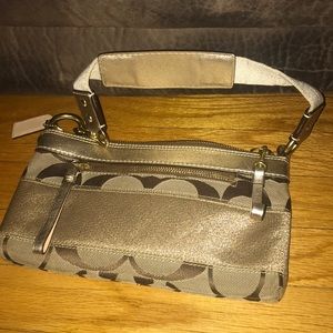 Coach thin gold bag with big C